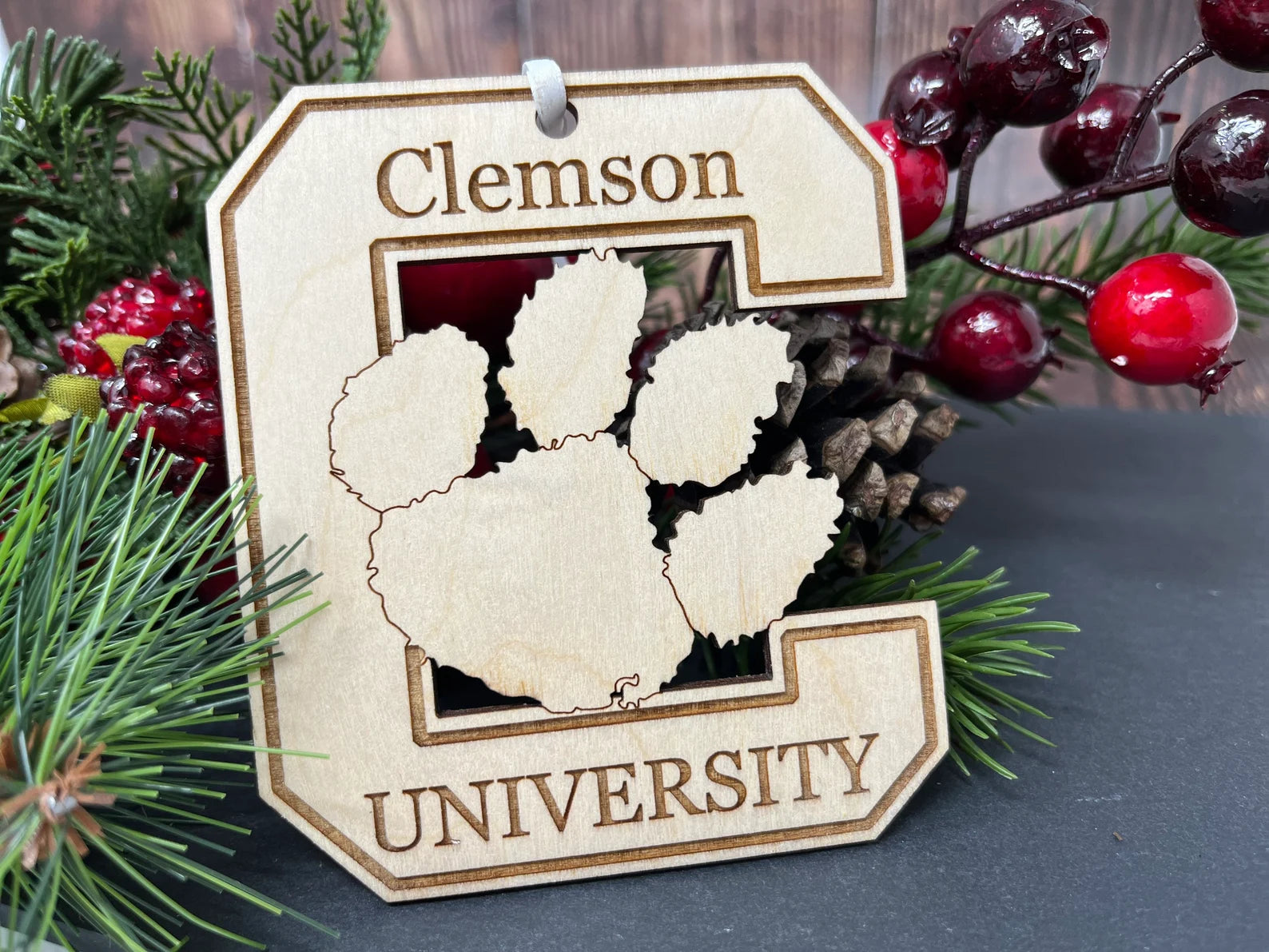 Handcrafted Clemson University Wood 'C' Ornament made of birch wood, measuring 4 inches by 4 inches, elegantly displayed in a premium cotton-filled box.